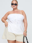 front view of model wearing Princess Polly Kiji Strapless Top White Curve Sleeveless straight 