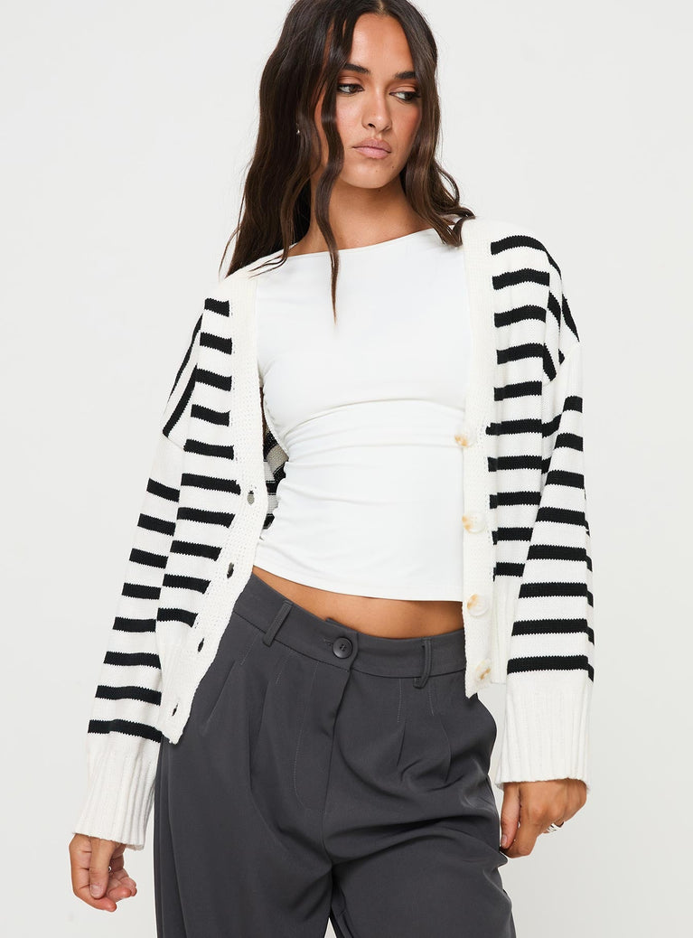 side view of model wearing Princess Polly Karlson Striped Cardigan Cream / Black Cropped 