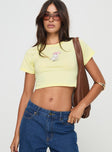 front view of model wearing Princess Polly Kewpie Best Of Friends Baby Tee Yellow Short Sleeves Crew Neck 