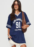 front view of model wearing Princess Polly Michail Jersey Dress Navy V-Neck 