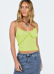 Front view of model wearing  front Princess Polly Sleeveless Square Neck  Fernad Ruffle Cami Green