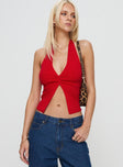 front view of model wearing Princess Polly Kingley Halter Top Red Sleeveless Plunger 