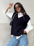 front view of model wearing Princess Polly Antonia Sweater Vest Black Cropped 