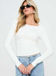 front view of model wearing Princess Polly Jakob Long Sleeve Top White Full Sleeves Scoop Neck 