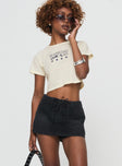 front view of model wearing Princess Polly Amethysta Denim Skort Black High Waisted Shorts 