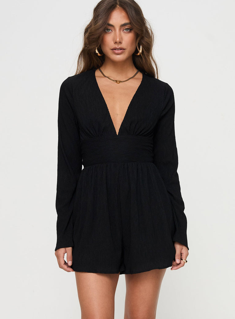 Long sleeve playsuit Plunging neckline, flared sleeves, tie fastening at back Good stretch, fully lined 