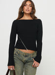 Long sleeve top Straight neckline, rib-knit material, split hem with zip fastening Good stretch, unlined 