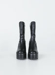 Boots Faux leather material  Mid-calf length  Zip fastening at side  Rounded toe Platform base  Block heel  Treaded sole