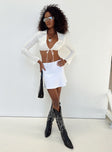 Front view of model wearing  front Banksia Mini Skirt White Princess Polly  Mini Skirts 