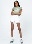 Front view of model wearing  front Princess Polly Short Sleeves Square Neck  Make Art Tee Green