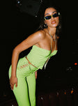 side view of model wearing Princess Polly Rhythm Stud Top Green 