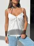 Front view of model wearing  front Princess Polly Sleeveless Sweetheart  Ladora Top White