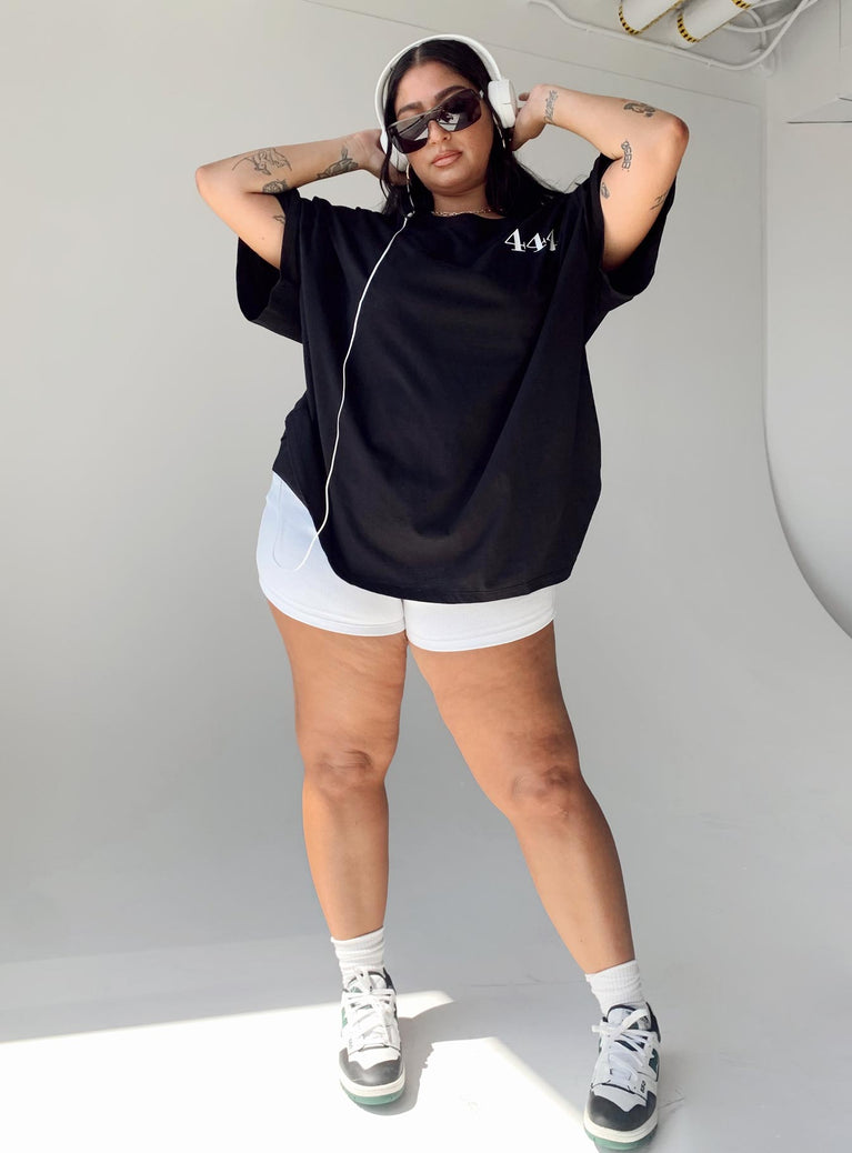 Front view of model wearing  front Princess Polly Short Sleeves High Neck  444 Oversize Tee Black Curve