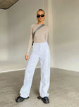 Front view of model wearing  front Princess Polly Mid Rise  Saffie Wide Leg Jeans White Denim