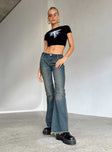 Front view of model wearing  front Princess Polly Low Rise Jeans  Carmella Low Waist Y2K Jeans Denim