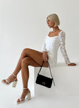 Front view of model wearing  front Princess Polly Asymmetric Neckline  Star Power Mini Dress White