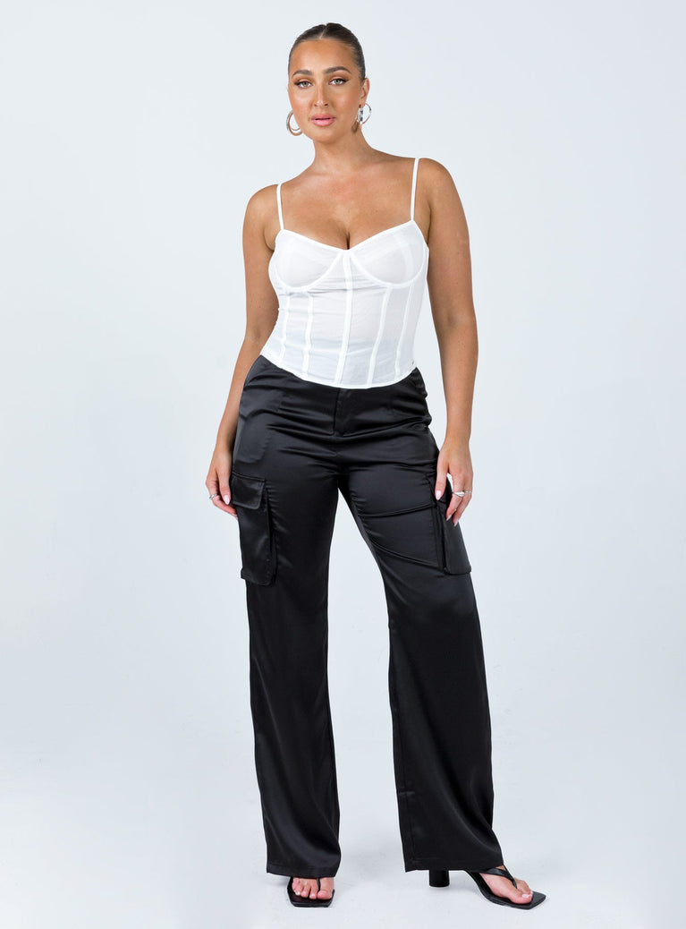 Front view of model wearing  front Princess Polly High Waisted Pants  Gilmore Cargo Pants Black