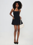 back view of model wearing Princess Polly Gigli Bubble Hem Mini Dress Black Tall Square Neck 