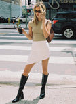 Front view of model wearing  front Ames Asymmetric Mini Skirt White Princess Polly  Mini Skirts 