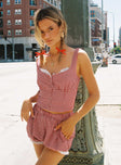 side view of model wearing Princess Polly Bruncheon Shorts Red/White mid-rise 