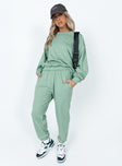 front view of model wearing Princess Polly Club Basic Trackpants Sage 