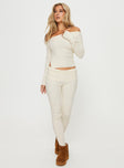 front view of model wearing Princess Polly Macallan Long Sleeve Top Cream Full Sleeves straight 