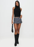 side view of model wearing Princess Polly Can't Sleep Skort Charcoal Stripe Low Rise Shorts 