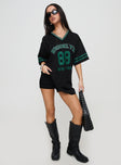 side view of model wearing Princess Polly Michail Jersey Mini Dress Green V-Neck 