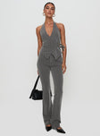 back view of model wearing Princess Polly Calexico Buckle Halter Top Grey Pinstripe Sleeveless V-Neck 