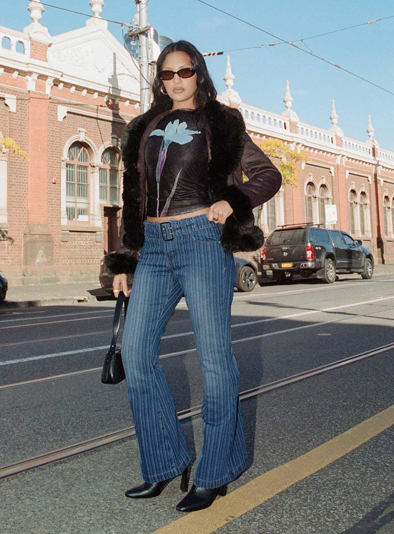 side view of model wearing Princess Polly Ralbartia Stripe Belted Jeans Mid Wash Mid Rise 