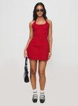 side view of model wearing Princess Polly Mallorie Halter Mini Dress Red Tall Scoop Neck 