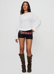 side view of model wearing Princess Polly Veracruz Long Sleeve Top White Full Sleeves Crew Neck 