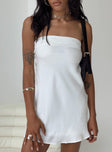 Front view of model wearing  front Princess Polly Asymmetric Neckline  Phillipa Mini Dress White