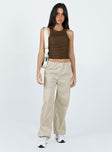 Front view of model wearing  front Princess Polly Sleeveless High Neck  Capano Top Brown