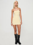 front view of model wearing Princess Polly Savins Strapless Mini Dress Yellow Straight Neck 