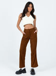 Front view of model wearing  front Princess Polly High Waisted Pants  Arizona Cord Pants Brown