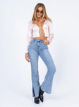 front view of model wearing Princess Polly Tampico Flare Leg Denim Jeans High Waisted 