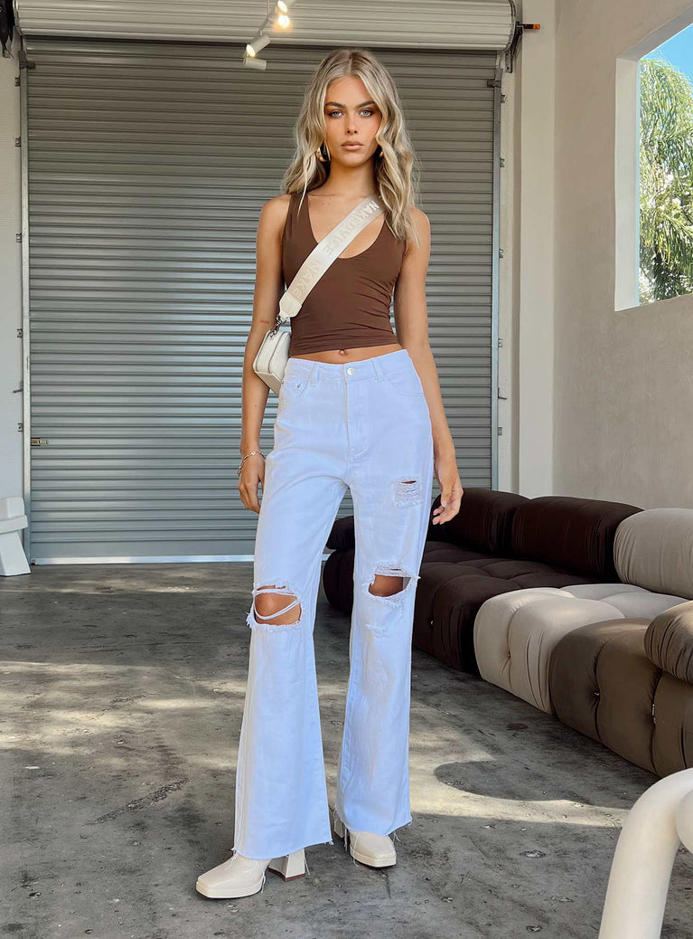 Front view of model wearing  front Princess Polly High Waisted  Meliana Wide Leg Denim Jeans White