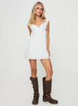 front view of model wearing Princess Polly Wittek Mini Dress White V-Neck 