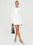 side view of model wearing Princess Polly Carters Long Sleeve Mini Dress White Crew Neck 