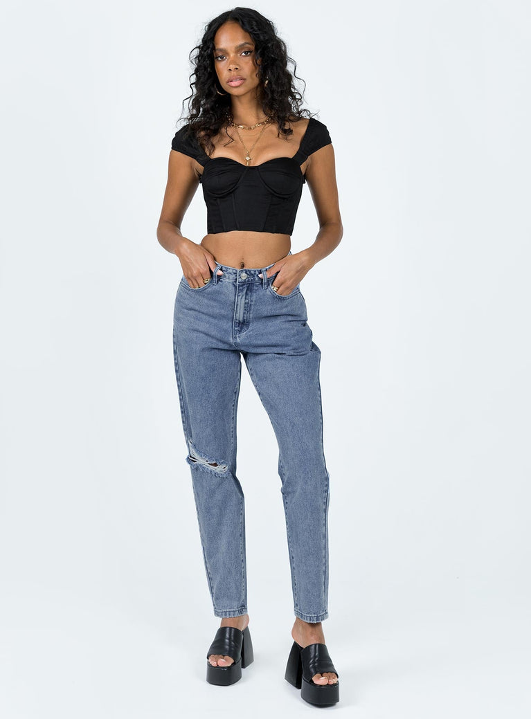 Front view of model wearing  front Princess Polly High Waisted  Unofficial High Waisted Mom Jean Light Wash Denim