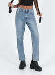 Front view of model wearing  front Princess Polly High Waisted  Ferrero Jeans Mid Wash Denim