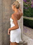 side view of model wearing Princess Polly Shellie Mini Dress White Tall Sweetheart Neckline 