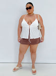 Front view of model wearing  front Princess Polly Sleeveless Scoop Neck  Chantria Top White Curve