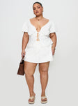 front view of model wearing Princess Polly Gulliver Tie Side Mini Skort White Curve High Waisted Shorts 