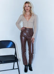 front view of model wearing Princess Polly Lillie PU Pants Brown 