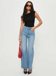 front view of model wearing Princess Polly Henesey Raw Hem Jeans Mid Wash High Waisted 