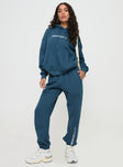 front view of model wearing Princess Polly Princess Polly Track Pants Block / Cursive Text Slate Mid Rise 