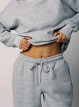 front view of model wearing Princess Polly Dream Fleece Ankle Cuff Sweatpants Grey Marle High Waisted Pants 