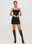 front view of model wearing Princess Polly Rousselet Mini Dress Black Square Neck 